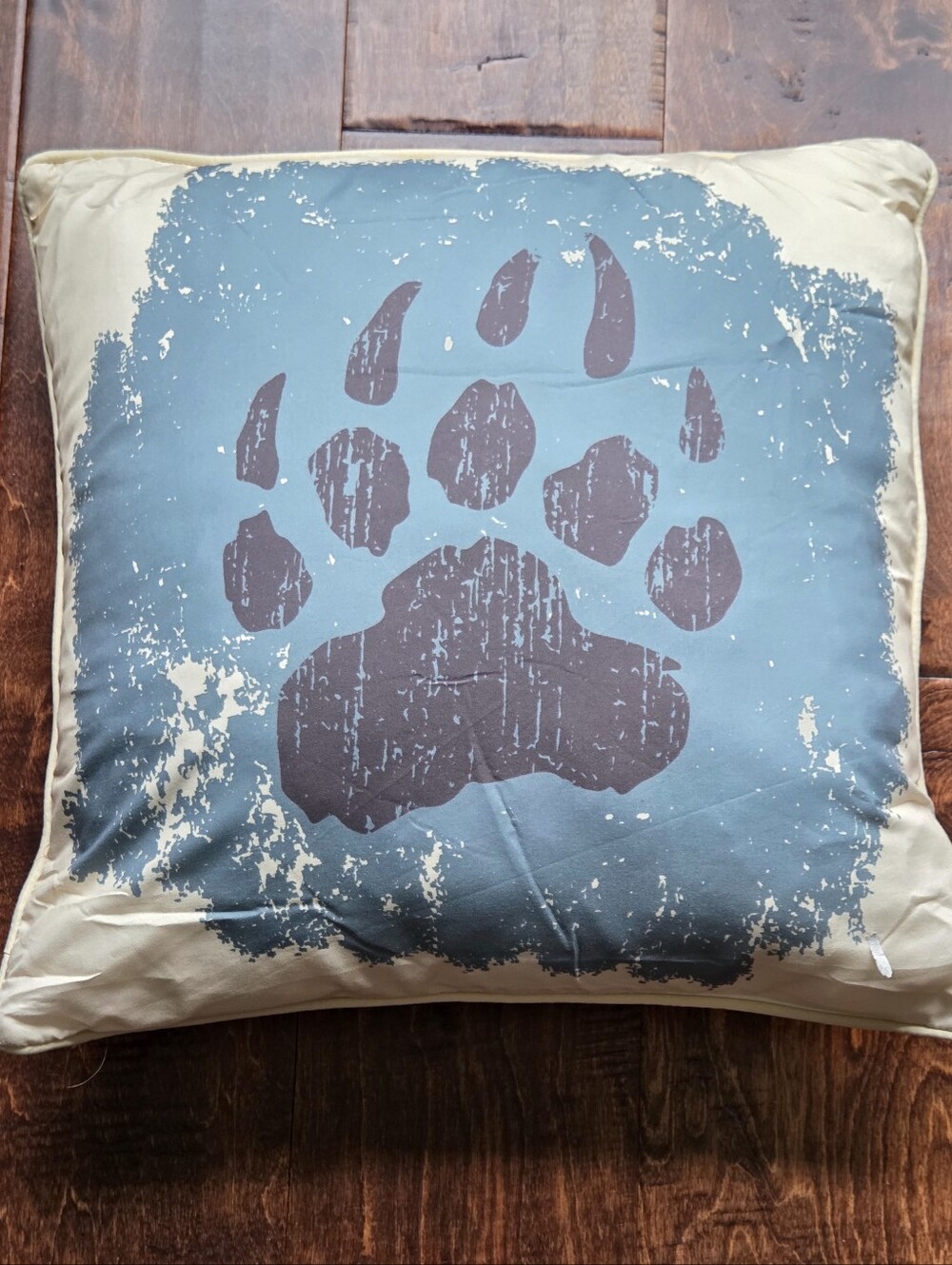 Blue and Beige Decorative Throw Pillow with Rustic Paw Print
